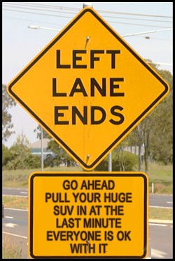 Guilt reducing road sign
